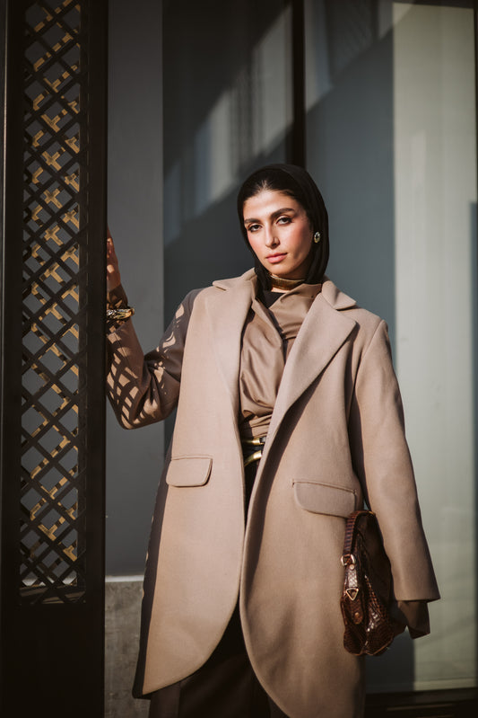 Asymmetrical wool coat